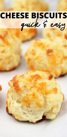 cheese biscuits on a baking sheet with text overlay