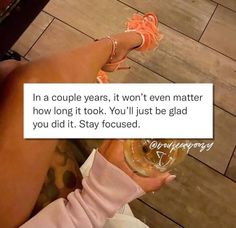 a woman's feet with orange heels and a note saying, in a couple years, i won't even matter how long it took