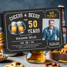 a beer and pretzel themed birthday party ticket is displayed on a table with pretzels