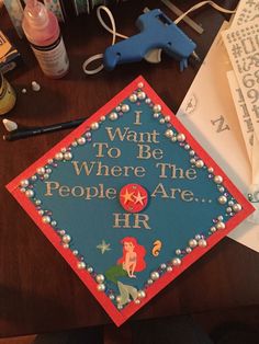 a graduation cap that says i want to be where the people are