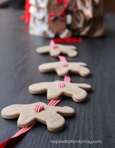 gingerbread men are lined up on the table