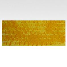 an orange and yellow painting with circles on it