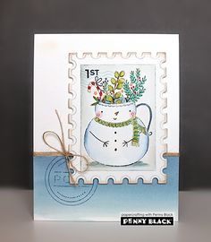 a stamp with a snowman in a mug on it