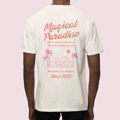 Magical Paradise Ivory Comfort Colors Tee. Large back print, blank front. ♥ SHIRT DETAILS Shirts are UNISEX. They are designed to be worn a bit loose. Recommended for men and women to order their standard size. For women who prefer a more fitted look, size down, for a more oversized look, size up. Long enough to be worn over leggings. Can be styled by tying in a knot and rolling up sleeves, tucked in, or worn loose. • 100% ring-spun cotton • Medium weight fabric • Trendy, boxy look Comfort Color White Spring T-shirt With Back Print, White T-shirt With Back Print For Spring, Summer White Tops With Front And Back Print, White Tops With Front And Back Print For Summer, Summer Relaxed Fit Top With Front And Back Print, Relaxed Fit Summer Top With Front And Back Print, White Shirt With Front Print For Summer, Summer Cream Shirt With Crew Neck, Summer Cotton Shirt With Back Print