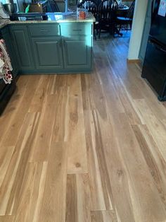 the kitchen is clean and ready to be used as a living room or dining area