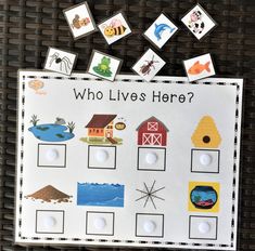 a white board with pictures and words on it that says who lives here? in the center