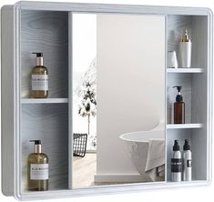 an open bathroom medicine cabinet with bottles and soaps on the shelf next to it