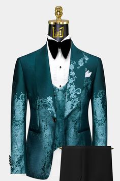 Introducing The Gentleman's Guru Teal Floral Suit - 3 Piece, an exquisite ensemble that flawlessly combines vintage charm with contemporary elegance. Crafted with meticulous attention to detail, this suit is designed to make a lasting impression at any formal occasion, reflecting your refined taste and impeccable style. The Teal Floral Suit boasts a slim-fit cut, ensuring a modern and tailored look that complements your physique with finesse. For those seeking a personalized fit, we offer a cust Embroidered Suit Men, Rapunzel Prom, Teal Suit, Tuxedo Prom, Suit 3 Piece, Floral Suit, Prom Tuxedo, Purple Suits, Vintage Floral Pattern