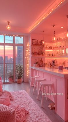 a bedroom with pink walls and lights on the ceiling