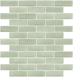 a white brick wall that has been made out of glass tiles and is very light green