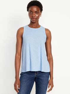 crew neck sleeveless relaxed swing fit with a flared hem hits at hip models are approx.  5'9" and wear sizes s (4), l (12), and xl (18)machine wash according to the care instruction label Blue Crew Neck Muscle Tee For Spring, Blue Relaxed Fit Tank Top, Blue Casual Muscle Tee For Spring, Blue Sleeveless Top With Relaxed Fit, Blue Relaxed Fit Sleeveless Top, Everyday Blue Sleeveless Tank Top, Blue Relaxed Fit Tank Top For Everyday, Casual Blue Sleeveless Tank Top, Chic Pants