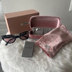 Condition - Excellent, Like New! Only Wore 2 Times Size - Standard Sunglass Size Shape - Cat Eye Color - Black/White With Silver Detailing Features - Comes With Original Box, Dust Bag, Cleaning Cloth, Book Authenticity - Serial Number Printed On Item As Pictured Miu Miu Accessories, Cat Eye Colors, Cloth Book, Sunglasses Shop, Colored Sunglasses, Cleaning Cloth, Eye Color, Miu Miu, Sunglasses Accessories