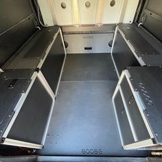 the inside of an empty van with no doors