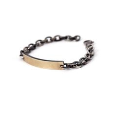 A classic with a twist, this beautiful men’s ID bracelet features a rectangular, slightly arched name plate in 14K yellow gold (.03mm thickover silver 925). The name plate is attached to a thick round linked chain made of solid sterling silver.   I can engrave name or initials you would like Classic Engraved Oval Link Chain Bracelet, Classic Rectangular Name Bracelet, Tarnish Resistant, Luxury Rectangular Gold Bracelet, Classic Tarnish Resistant Name Bracelet, Modern Rectangular Gold Bracelet With Polished Finish, Classic Yellow Gold Rectangular Name Bracelet, Classic Engraved Link Chain Bracelet, Minimalist Gold Bracelet With Polished Rectangular Links, Classic Engraved Metal Chain Bracelet