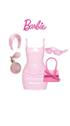 the barbie doll is dressed in pink and has accessories for her to wear on it