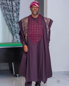 Elevate your style with our Custom-Made Men's Agbada Set - a perfect blend of tradition and modern elegance. This stunning Agbada features a rich teal color with intricate embroidery on the chest panel, reflecting the craftsmanship and attention to detail that goes into every piece. The design is tailored for a relaxed yet sophisticated fit, ideal for special occasions or cultural events. Key Features: *Material: Premium-quality fabric for a luxurious feel and long-lasting wear. *Color: Availabl Ceremonial Agbada For Eid With Traditional Drape, Traditional Groom's Agbada For Festive Occasions, Traditional Agbada For Groom In Festive Season, Traditional Festive Agbada For Groom, Eid Agbada For Traditional Ceremonies, Festive Agbada With Traditional Patterns For Eid, Festive Eid Agbada With Traditional Patterns, Agbada Styles Men, Agbada For Men