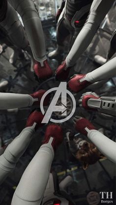 the avengers logo is surrounded by many white and red hands with black fingers on them