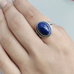 NOTE : WE USED NATURAL GEMSTONES , SO STONE  MAY BE LITTLE DIFFERENT .This  is a listing  of Boho sterling silver ring  # metal = sterling silver  925  # Gemstone  - Lapis Lazuli # Ring Size - Available in all Size  # Stone Color - Blue # Stone Shape - Oval Handmade Crafting bohemian Ring - This style has bohemian style . it will look beautiful when you wear it .. Thanks for visiting our shop ...  favorite our shop for daily updates ... Bohemian Gemstone Midi Rings For Gift, Adjustable Bohemian Stackable Gemstone Rings, Bohemian Blue Stackable Round Rings, Bohemian Oval Crystal Ring Nickel-free, Bohemian Oval Crystal Ring Nickel Free, Bohemian Style Oval Crystal Ring Nickel Free, Adjustable Oval Bohemian Rings, Bohemian Blue Handmade Stackable Rings, Bohemian Stackable Rings As Gift