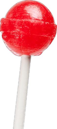 a red and white lollipop on a stick