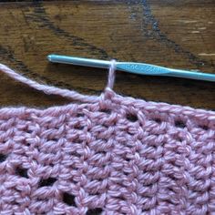 the crochet stitch is being worked on