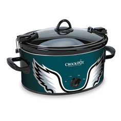 the philadelphia eagles nfl slow cooker is shown in black and green with an emblem on it