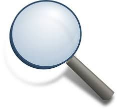 a magnifying glass is shown on a white background with clippings to the side