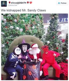 two people dressed as characters sitting in front of christmas trees