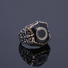 This special ring will be best part of your collection. This is a customization available vintage pagan statement ring for men. You can make customization on the top symbol. Can be Odin's bird Raven and Valknut, symbol of natural balance Thors Hammer, Gungnir, Vegvisir and troll cross etc..Please contact for your customization details. Looking for a unique, one of a kind GIFT FOR HIM, groomsman gift, father's day gift, teacher day gift? Look no further. This cool gemstone ring is the right answe Symbolic Open Ring Jewelry With Ring Detail, Symbolic Engraved Open Ring Jewelry, Symbolic Open Ring Jewelry With Polished Finish, Symbolic Open Ring With Polished Finish, Symbolic Open Ring Metal Jewelry, Symbolic Jewelry With Open Metal Ring, Luxury Sterling Silver Metal Ring, Sterling Silver Open Ring Jewelry Engraved, Engraved Sterling Silver Open Ring