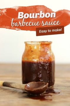 bourbon barbecue sauce in a jar with a spoon