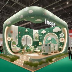 an exhibition booth with green and white decor