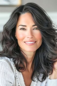 Subtle Silver Streaks on a smiling woman with layered dark hair. Silver Streak In Dark Hair, Layered Dark Hair, Dark Hair Ideas, Hair Dimension, Medium Dark Hair, Dark Hair Color, Short Shag Haircuts, Smiling Woman