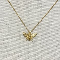 Cute and lovely Bumble Bee Necklace on Beautiful Shimmering Chain, Honey Bee necklace for Women, Elegant Dainty Bee pendant on Gold Chain  Item details ✰ Color: gold, silver ✰ Finish: matte finish 14K gold/ silver plated pendant ✰ Shimmering high quality 15-19" chain length ✰ High quality clasp to finish  ✰ Comes in a cute gift box, perfect for gift-giving! Honey Bee Necklace, Book Edits, Bumble Bee Necklace, Bee Pendant, Cute Gift Boxes, Bee Necklace, Fancy Jewelry, Honey Bee, Necklace For Women