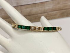 Welcome to Gold Knox Beautiful 14k yellow gold round cut diamond and green higher grade emerald tennis women's bracelet. Great piece and gift idea for any special occasion. Details below: Material 14k gold, diamond, emerald Weight 13 gm Diamond 0.30ct (1.5mm each) Emerald 4ct ( 4mm X 2.5mm) This would make great addition to your jewelry collection. Thank you for looking SHIPS SAME DAY PLEASE, BE SURE TO VIEW THE PICTURES CAREFULLY AND CLOSELY AS IT IS THE EXACT ITEM YOU ARE BUYING. Gold Knox Jew Green Bangle Tennis Bracelet For Anniversary, Emerald Tennis Bracelet, Buying Gold, Wedding Bracelet, Tennis Bracelet, Round Cut Diamond, Womens Bracelets, Round Cut, Gold Diamond