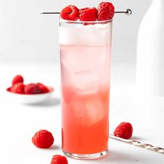 a tall glass filled with raspberry lemonade