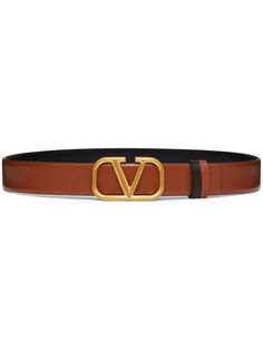 chocolate brown/black calf leather reversible VLogo Signature gold-tone hardware adjustable fit logo-buckle fastening punched holes This piece comes complete with a protective dust bag. This piece comes with a certificate of authenticity. Saddle Brown, Belt Style, Reversible Belt, Boutique Online, Watch Design, Valentino Garavani, Smooth Leather, Leather Belt, Accessories Design