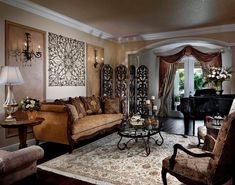 a living room filled with furniture and a piano