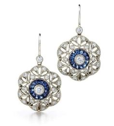 Floral Style Art Deco Earring Openwork Art Deco Earring Blue Baguette & Round Diamond Earring Lever Back Dangle Earring Dangle Drop Earring **Returns and Refunds** 30-Day Returns All our diamonds have Paid 6 Months guarantee! We are fully behind every diamond and piece of jewelry that we sell. It is vital for us that you are totally happy with your purchase. If you are not 100% happy with your purchase, you can return it to us within 30 days of purchase for a full refund or exchange. Happy Shopp Art Deco Drop Earrings, Round Cut Diamond Earrings, Dark Blue Earrings, Round Diamond Earrings, Sapphire And Diamond Earrings, Vintage Sapphire, Vintage Inspired Jewelry, Retro Earring, Art Deco Earrings