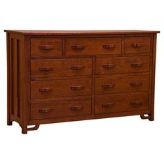 a large wooden dresser with many drawers