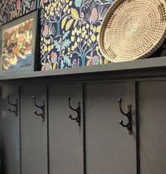 a bunch of lockers that are next to each other with some pictures on them