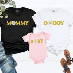 Daisy First Birthday Family Shirts, 1st Birthday Tee For Mom and Dad, Matching Mothers Day Gift Shirts, Daisy Mama Dada Kids Baby Outfits. HI! Welcome to my store, I'm delighted to see you here. My store's main goal is to provide you with premium everyday apparel with the best graphic t-shirts. I see you as a friend, not just a customer. I'm sure you'll love my designs. You can order the same design 4XL and 5XL large sizes from the link, please specify the details in the order note.   https://et Family Matching Shirt With Name Print For First Birthday, Family Matching Letter Print T-shirt For First Birthday, Family Matching T-shirt For First Birthday, Family Matching Custom Print T-shirt For First Birthday, Cute T-shirt For First Birthday And Father's Day, Cute T-shirt For First Birthday On Father's Day, Family Matching T-shirt With Name Print For First Birthday, Family Matching Name Print T-shirt For First Birthday, Family Matching T-shirt For First Birthday And Father's Day