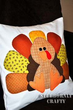 a pillow with a turkey design on it