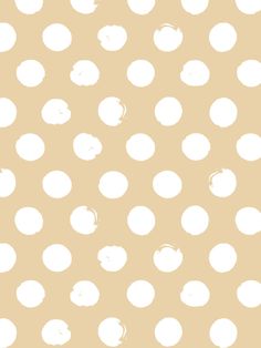 a white polka dot pattern on an orange background