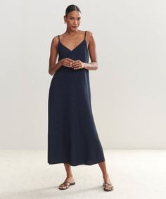 Riviera Slip Dress Navy In a textural raw silk and the classic silhouette you know and love, the Riviera Dress is the epitome of decadence meant for everyday. Wear it alone as a statement piece made for dressier moments or as the perfect luxe layer under your favorite cozy knit. 100% raw silk. Made in China. V-neck, ankle-length dress. Chic Viscose Slip Dress For Daywear, Elegant Unlined Maxi Dress For Brunch, Elegant Sleeveless Loungewear Maxi Dress, Elegant Sleeveless Maxi Dress For Loungewear, Elegant Sleeveless Maxi Lounge Dress, Chic V-neck Maxi Dress For Loungewear, V-neck Viscose Dresses For Loungewear, Elegant Viscose Slip Dress For Brunch, Chic Linen Slip Dress