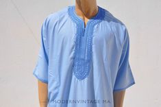 Moroccan kAFTAN for men, oriental kaftan, All sizes are Available  Beautiful Moroccan kaftan in cotton for men. This Moroccan clothing is handmade in soft fabric cotton.  This kaftan is very pleasant to wear mainly in summer, at the beach, after a spa, indoor, outdoor, at a party... Very fast to wear, not stick to the skin, this kaftan is a really must have clothing.  - Cotton  - embroidery - Machine washing return policy  I check myself each product and sell only the best quality products in any case ; if you are not satisfied with the  product . first; please contact me and i will do everything to your satisfaction.  In any case you have a 100% Guarantee and refund.  within 14 days in its original packaging and an condition the item is its original condition as received.  buyer pay shipp Casual Cotton Thobe For Eid, Casual Short Sleeve Thobe For Eid, Traditional Blue Short Sleeve Thobe, Blue Short Sleeve Traditional Thobe, Traditional Short Sleeve Kaftan For Loungewear, Traditional Cotton Short Sleeve Thobe, Ramadan Clothes, Caftan For Men, Kaftan Ramadan