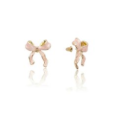 Designed for every girl, these pink bow ribbon studs are a staple for your jewelry box. They shimmer with a high polish finish and feel light as a feather. So comfy and chic, you'll never want to take them off.More Details:- Carefully Handmade- 100% Hypoallergenic- Stainless Steel - Size: H: 23 mm W: 22 mm- Metal Color: 18k Gold Artistic Earrings, Trendy Stud Earrings, Safety Pin Earrings, Light As A Feather, Bow Ribbon, Snake Design, Tie Bow, Studs Earrings, Bow Earrings