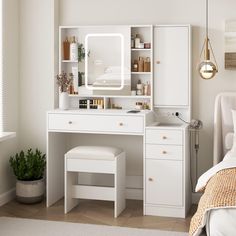 a bedroom with a bed, desk and mirror