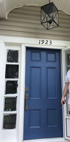 Bright, cool toned blue front door Sherwin Williams Down Pour Down Pour Sherwin Williams, Purple Paint Color, Sherwin Williams Blue, Purple Paint Colors, Superhero Bedroom, Pour Paint, Exterior Front Doors