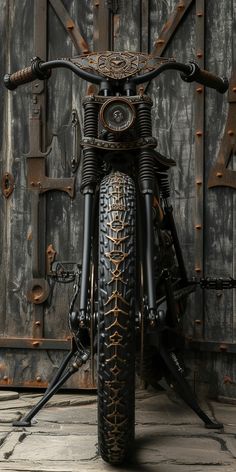 a close up of a motorcycle parked in front of a wooden wall with rusted metal parts