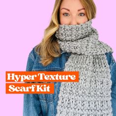 a woman wearing a gray knitted scarf with the text hyper texture scarf kit over her face