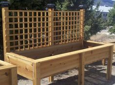 two wooden benches sitting next to each other